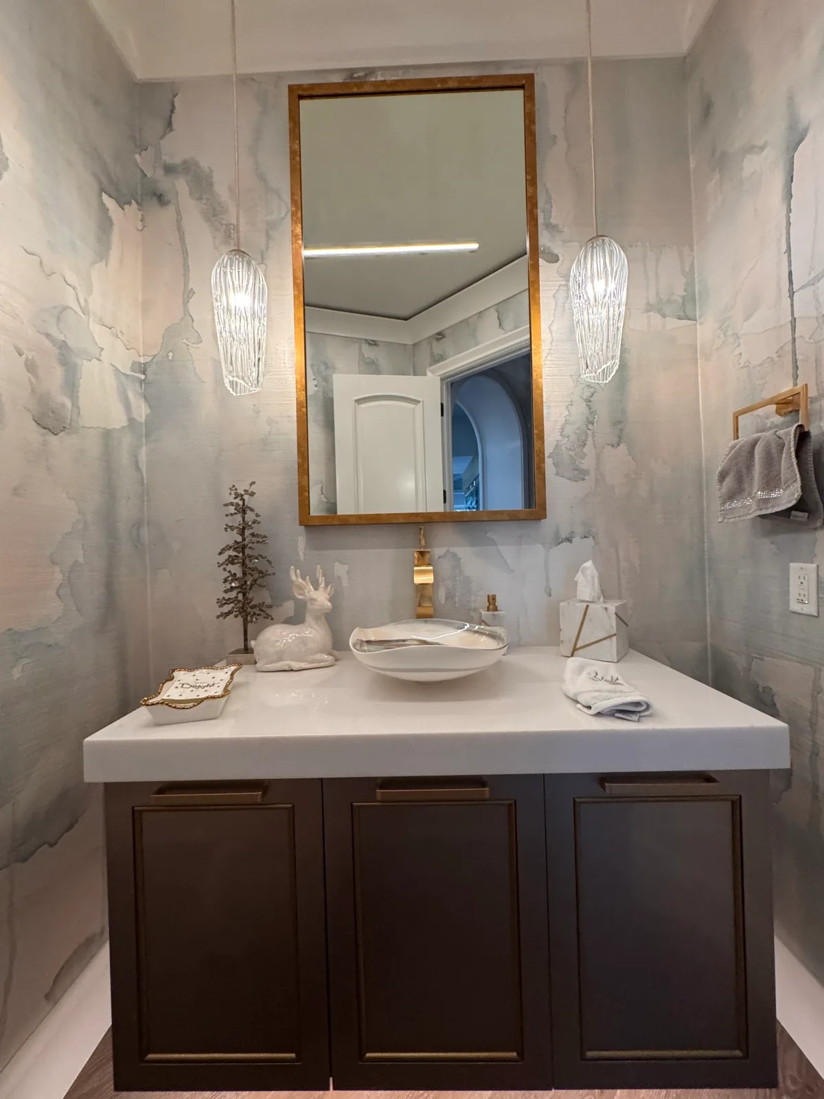 Powder room in a hand-marbled plaster finish