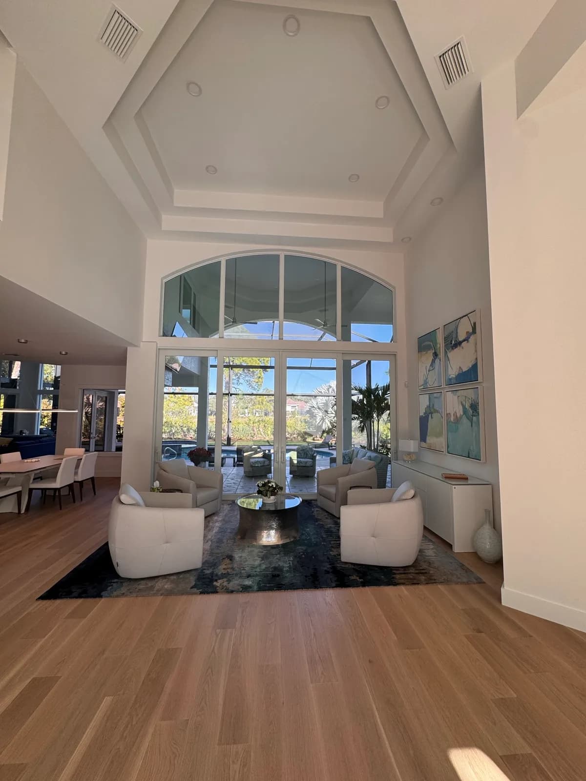Double-height great room with arched windows