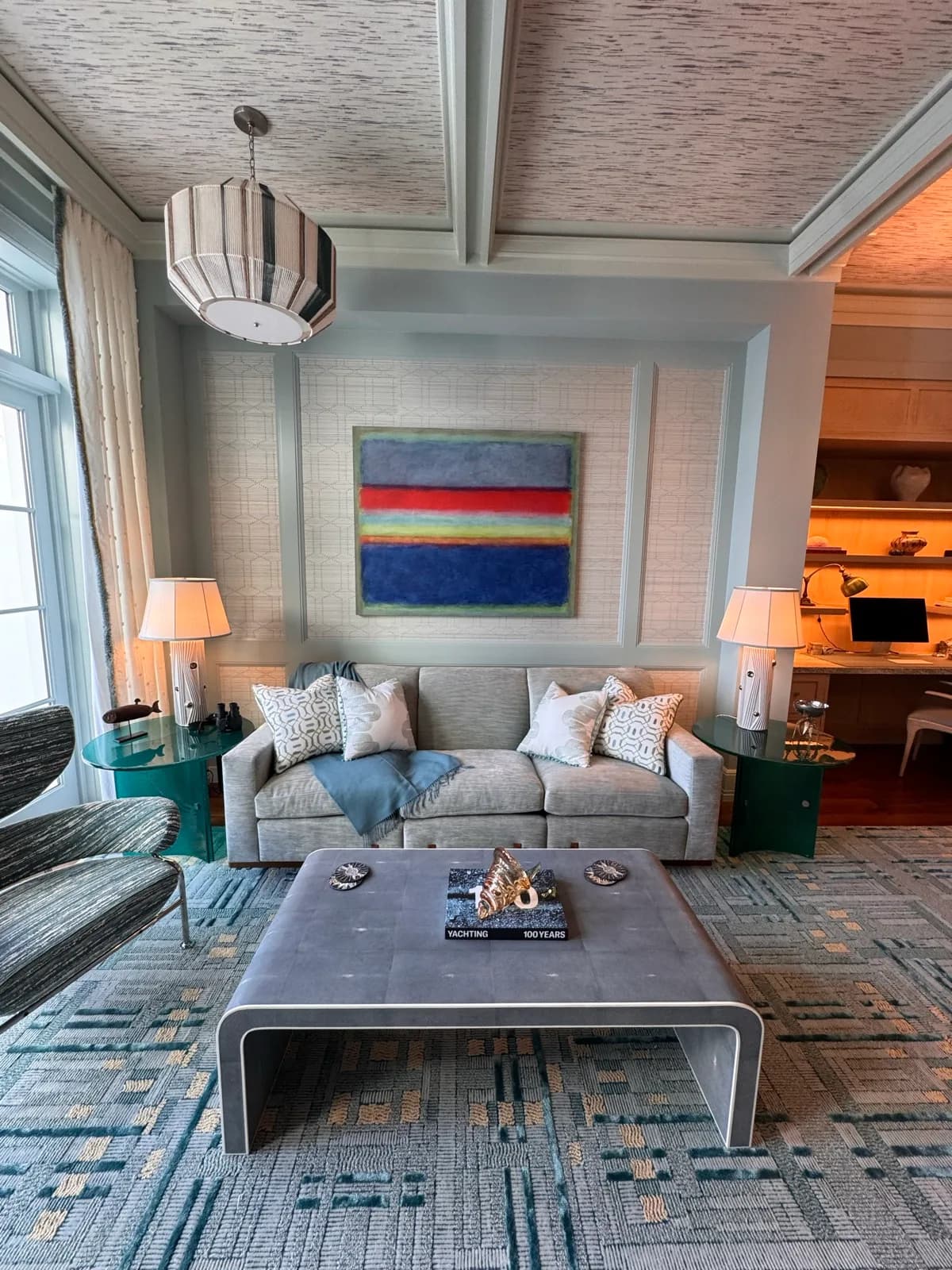 Living room with a painted feature wall behind the sofa
